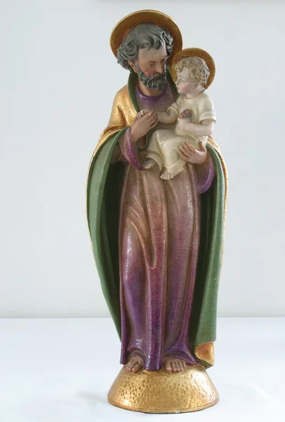 Saint joseph holding bebek İsa — Stok fotoğraf