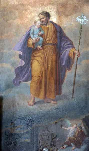 San José sosteniendo al niño Jesús — Foto de Stock