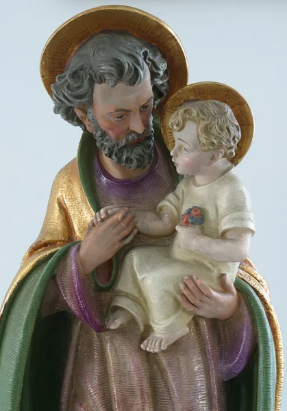 Saint joseph med barnet jesus — Stockfoto