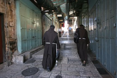 Monks on the street of Jerusalem clipart