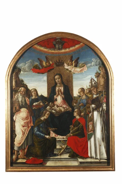 Madonna og barnet på tronen kronet av to engler, med Gud Fader, Hieronymus, Agnes, Lucia, Katarina av Alexandria, Ursula, og Bernard av Clairvaux – stockfoto