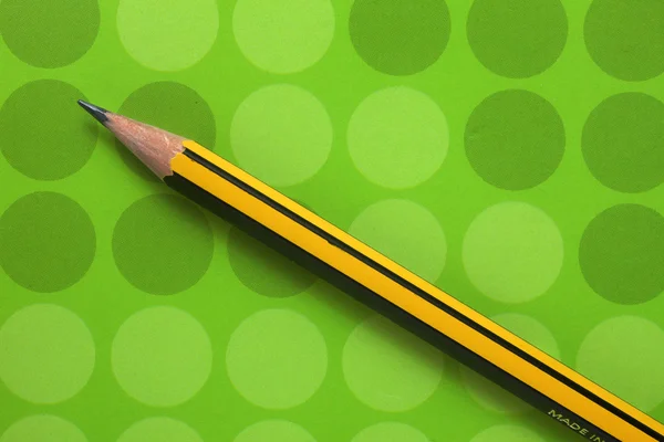 Олівець на блокноті — стокове фото