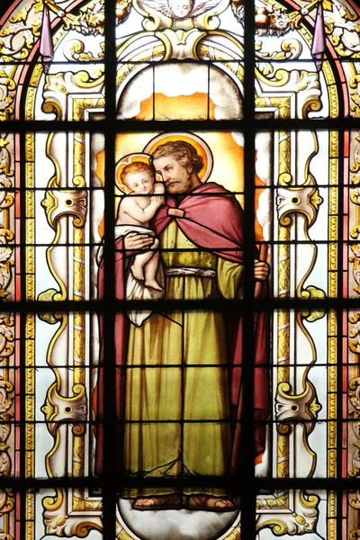 Saint Joseph holding baby Jesus — Stock Photo, Image