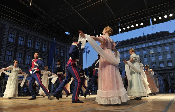 Members of the ensemble song and dance Warsaw School of Economics in in old style costumes — Stock Photo, Image