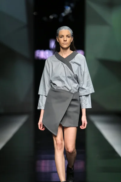 Fashion model wearing clothes designed by Petra Vuletic and Sasa Hortig on the 'Fashion.hr' show — Stock Photo, Image