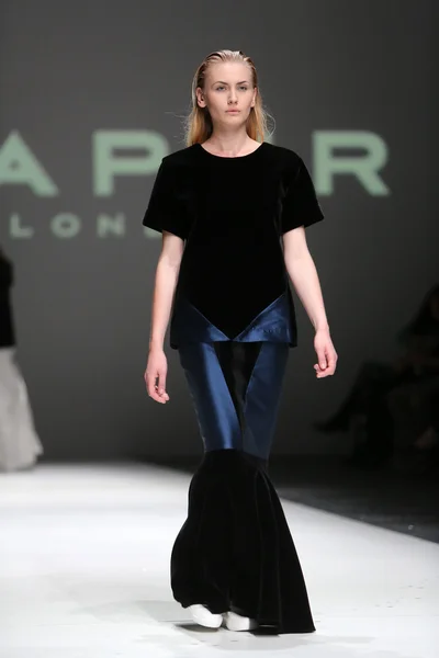 Fashion model wearing clothes designed by Paper London on the Zagreb Fashion Week on May 09, 2014 in Zagreb, Croatia