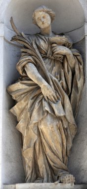 Saint Lucia, marble statue. St. Lucia Church. Parma. Italy clipart