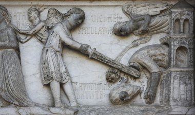 Beheading of St. John the Baptist, detail of marble carvings on the Baptistery, Parma, Italy clipart