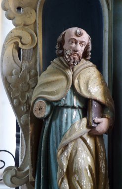 Hırvatistan 'ın Volavje kentindeki Our Lady of the Snows kilisesindeki Aziz Stephen mihrabında bir azizin heykeli