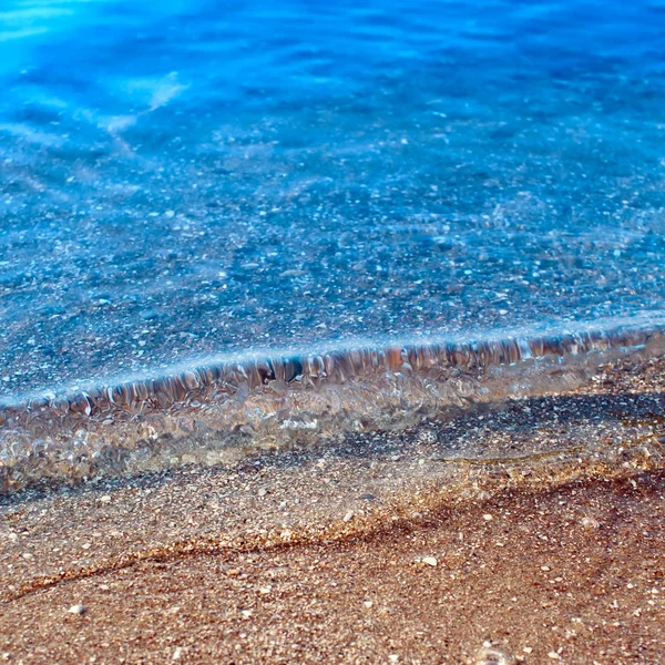 Waves on the sand — Stock Photo, Image