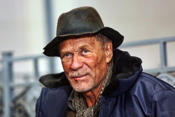 Male homeless beggar