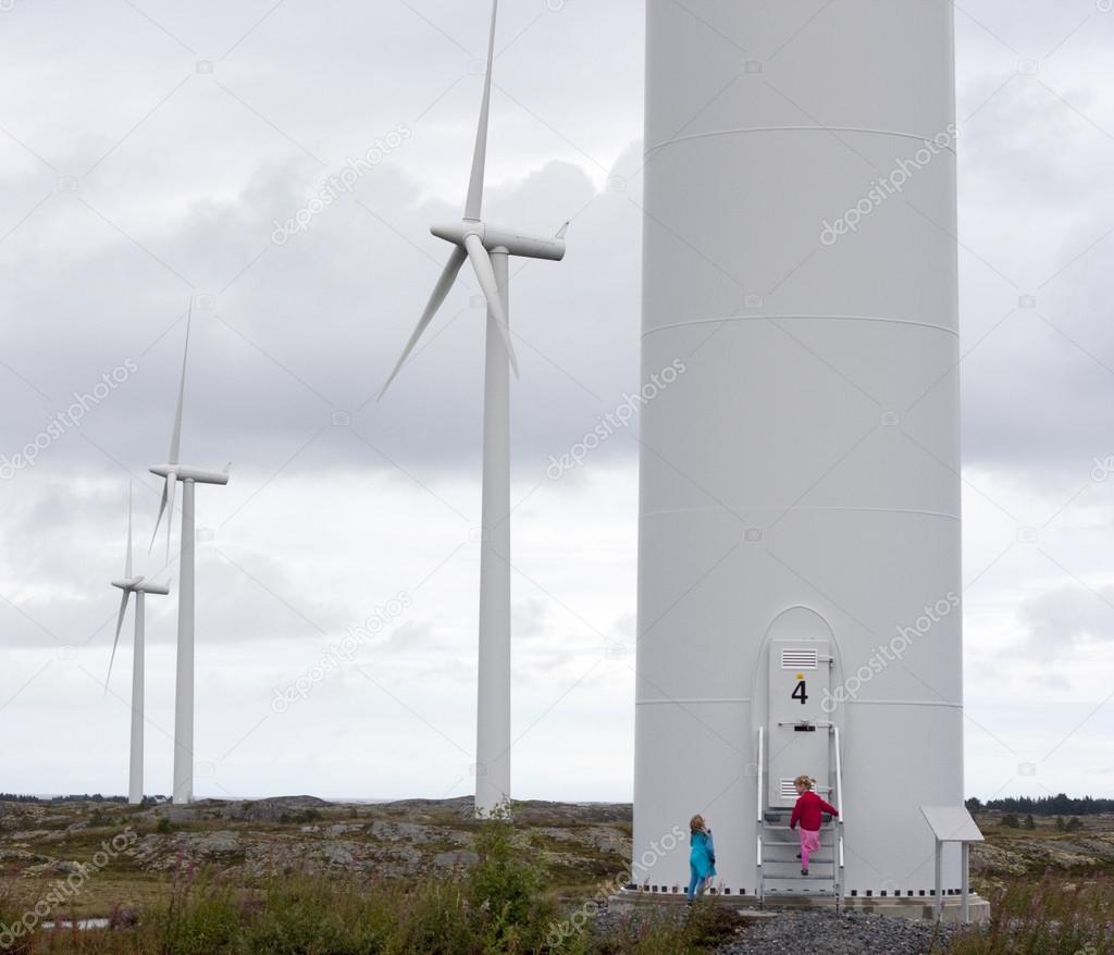 Children looking at windmills