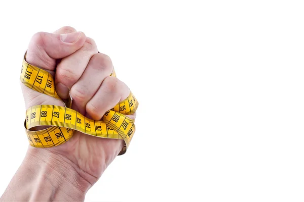 Fist with measuring tape - Concept Photograph with much Space fo — Stock Photo, Image