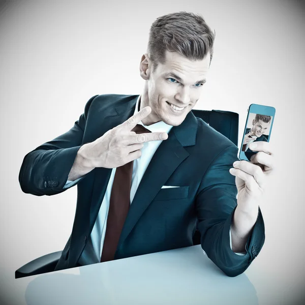 Businessman taking a selfi — Stock Photo, Image