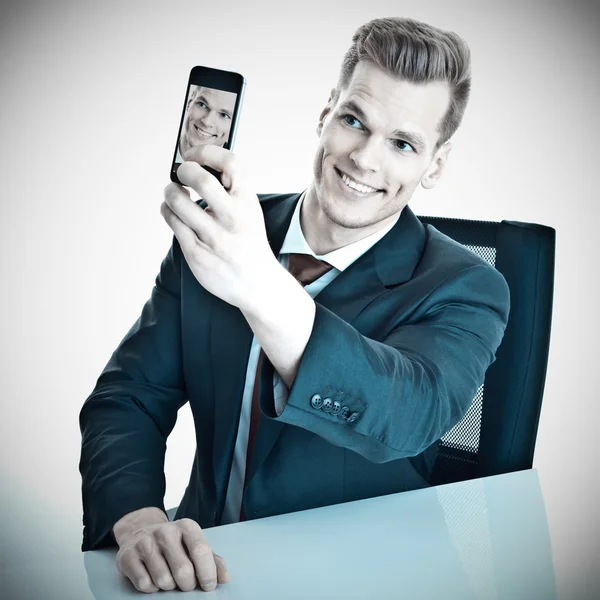 Businessman taking a selfi — Stock Photo, Image