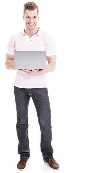 Jonge man aan het werk op zijn laptop - volledige lengte ontsproten en geïsoleerd — Stockfoto