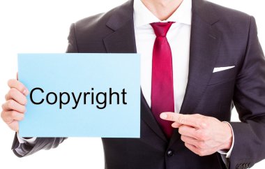 telif hakkı kavramı - word copyr ile işadamı gösteren kartı