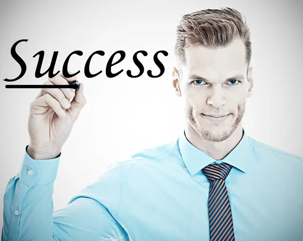 Success - Young businessman underlines the word success on a gla — Stock Photo, Image