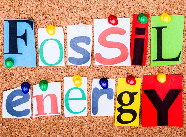 The phrase Fossil energy in cut out magazine letters pinned to a