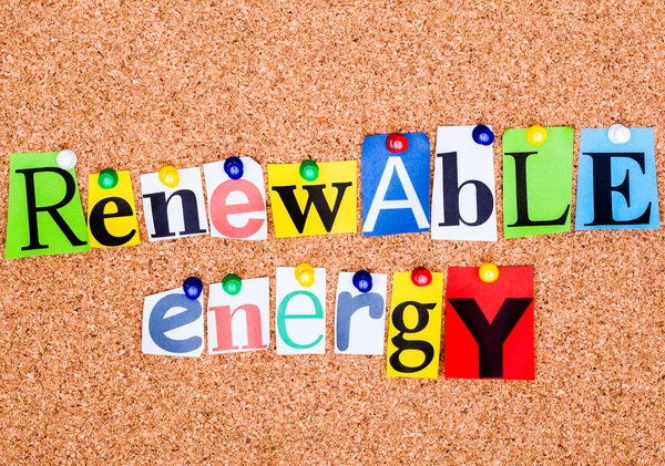 The phrase Renewable energy in cut out magazine letters pinned t — Stock Photo, Image