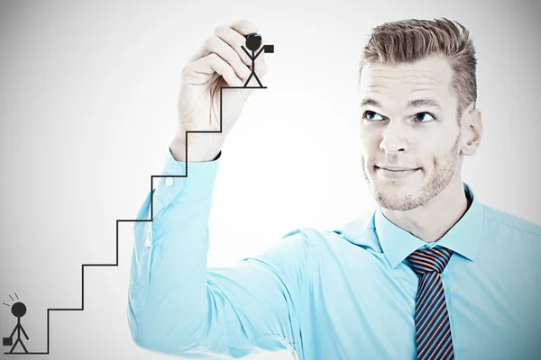 Young businessman drawing a career ladder concep — Stock Photo, Image