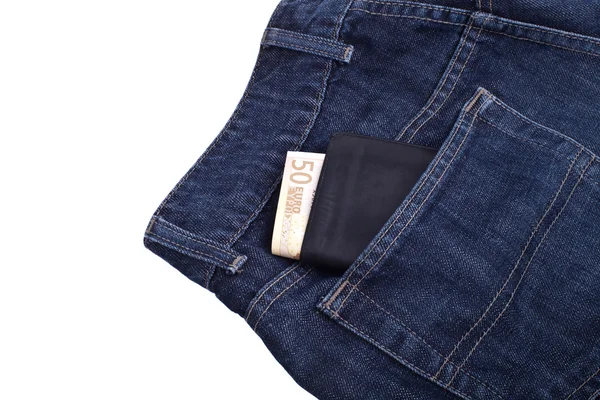 Portefeuille met geld in jeans zak, volledig geïsoleerd op whit — Stockfoto