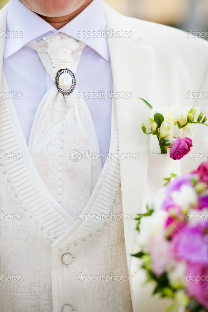 Close-up of elegance groom suit and tie