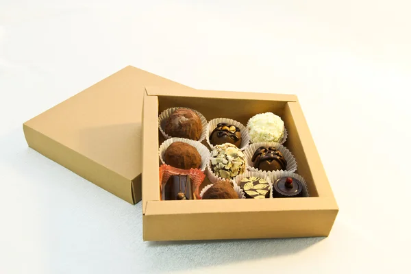 Handmade chocolates box on a white background — Stock Photo, Image