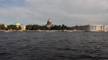 St. Petersburg, Russia - the 9th of June 2021, The view of the Saint Isaac's Cathedral, Admiralty spire and the building complex of the former Senate and Synod from the other bank of the Neva river