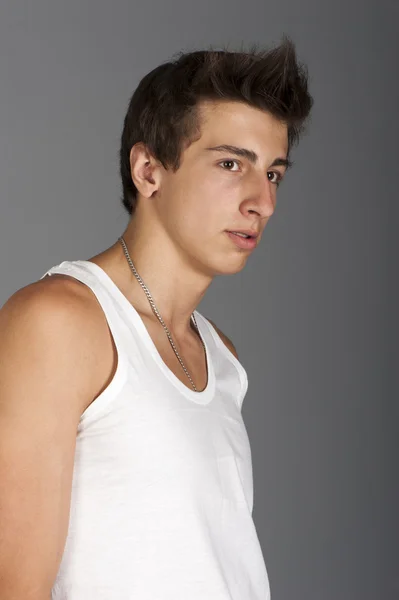 Young man in a white t-shirt — Stock Photo, Image