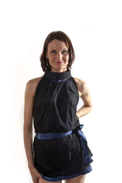 Jonge vrouw in een blauwe jurk — Stockfoto