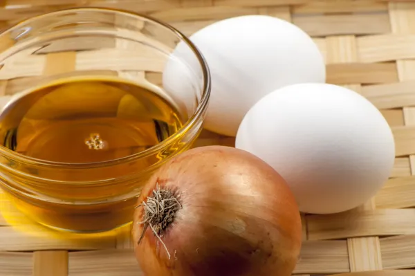 Vajíčko a rostlinný olej — Stock fotografie