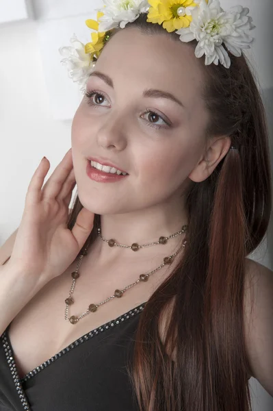 Young woman in a dark dress — Stock Photo, Image