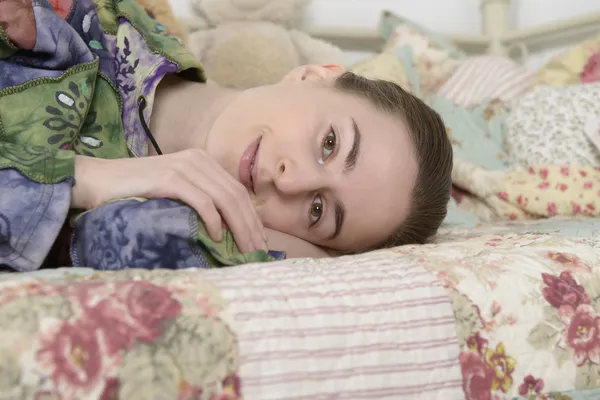 Portrait of a young woman in an interior children's room — Stock Photo, Image