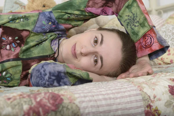 Portrait of a young woman in an interior children's room — Stock Photo, Image