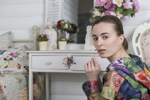 Young woman in the children's room — Stock Photo, Image