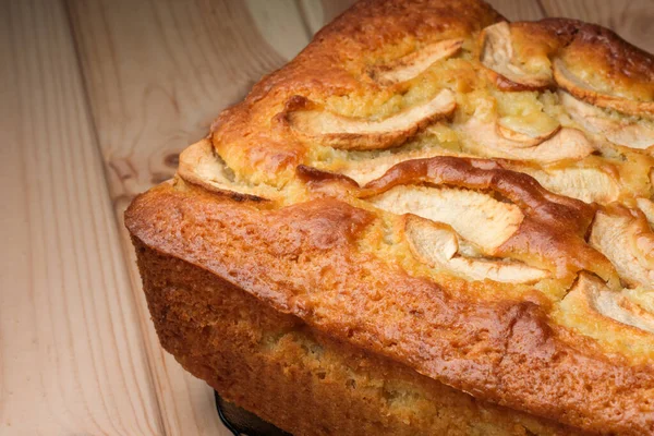 Delicious apple pie baked in the oven of a gas oven close-up macro photography