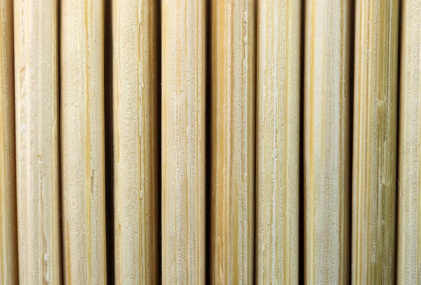 Texturované Dřevěné Pozadí Bambusových Kulatých Tyčinek Ležících Bok Boku Celoobrazovkové — Stock fotografie