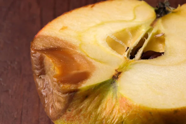 Half Spoiled Shriveled Rotting Apple Dark Wooden Background Close — Stock Photo, Image