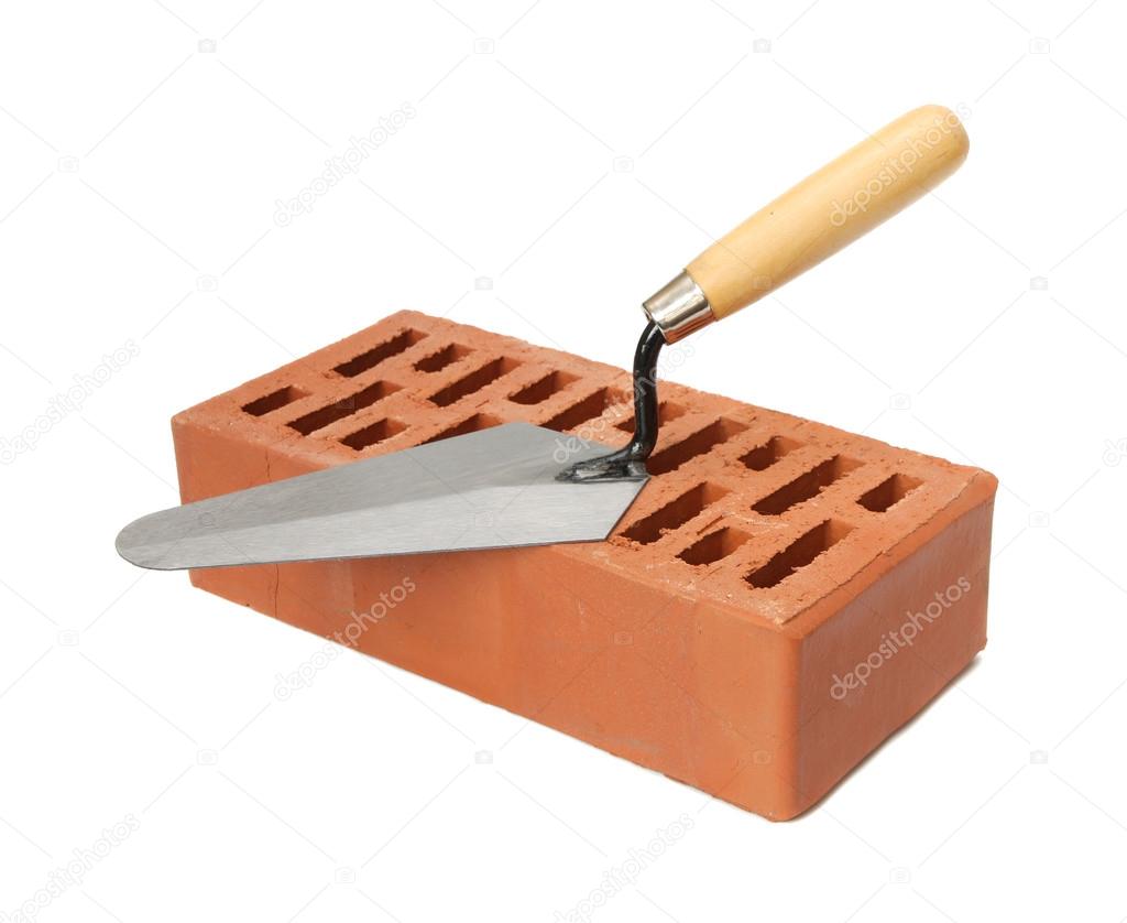 Trowel with red brick.