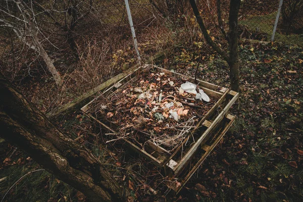 palette composter for garden leftovers in autumn after season