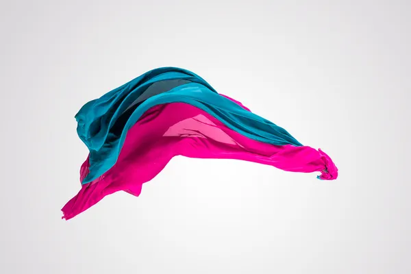 Tecido multicolorido abstrato em movimento — Fotografia de Stock