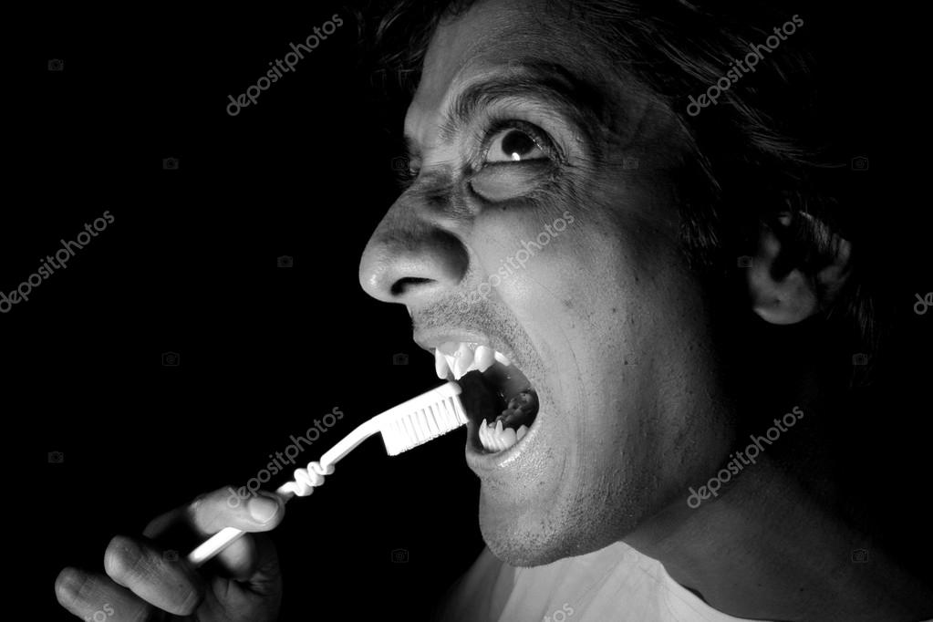 Cleaning Vampire Teeth — Stock Photo © thefinalmiracle 14033792
