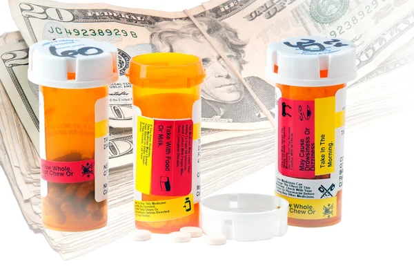 Botellas de Medicina y Dinero — Foto de Stock