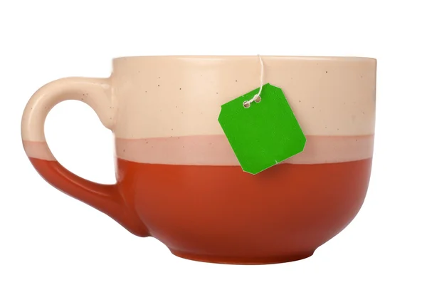 Šálek s čajovým sáčkem — Stock fotografie