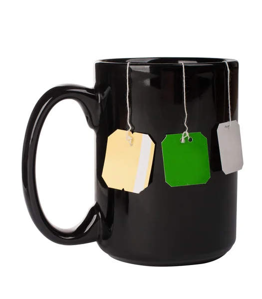 Tasse mit drei Teebeuteln — Stockfoto