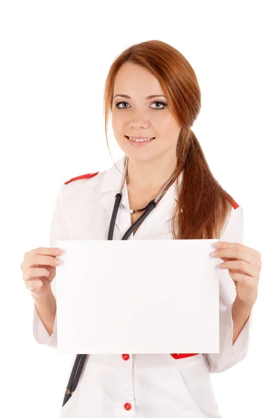 Female doctor holding an empty card — Stock Photo, Image