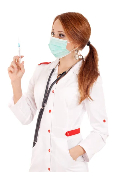 Young doctor holding syringe — Stock Photo, Image