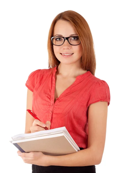 Student writing in work book — Stock Photo, Image