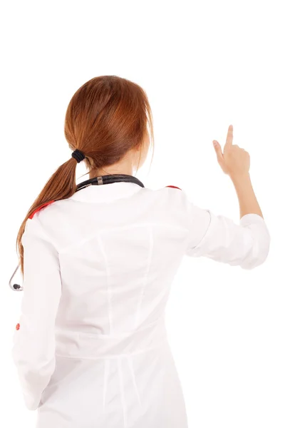 Young female doctor touchung virtual screen — Stock Photo, Image